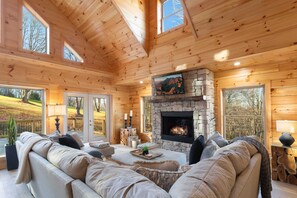 Stacked Stone Gas Log Fireplace in the Comfortable Main Floor Living Room