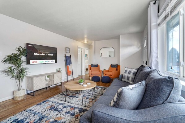 Cozy Up in Our Couches and Enjoy Your Favorite Netflix Series on Our Smart TV!