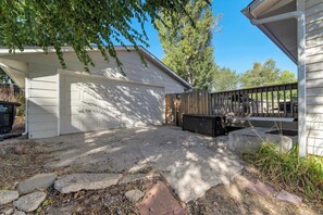 Spacious backyard patio area – ideal for outdoor dining and relaxing in the shade.