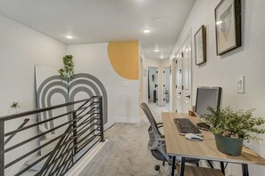 We have a dedicated workspace right next to the main bedroom.