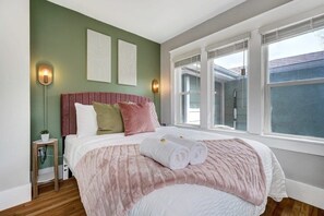 We have a queen-size bed in the other bedroom. Enjoy this cozy room and the bed is perfect for a restful night!