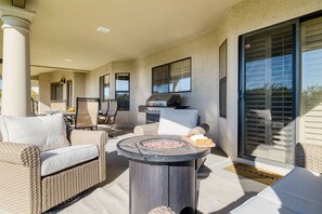 Sizzle and socialize by our fire pit and BBQ grill combo.