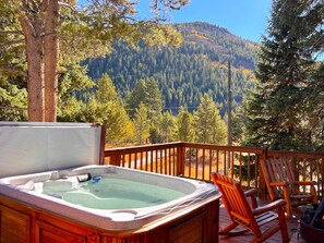 Soak under the starry night in our private hot tub