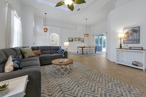 Open floor plan with extra high ceilings