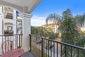 The balcony at Vista Cay Resort offers a picturesque vantage point, allowing guests to soak in the breathtaking views and enjoy moments of relaxation amidst the refreshing outdoor ambiance.