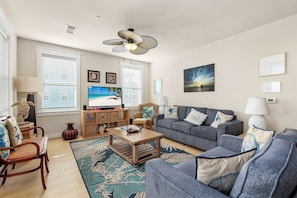 Living area has LED smart TV & front row beach front views.