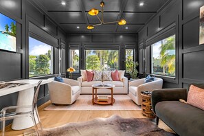 This luxurious room is the perfect blend of relaxation, play, and work. The sofa converts to a full memory foam sleeper sofa. Enjoys hours of games with the Nintendo Switch.