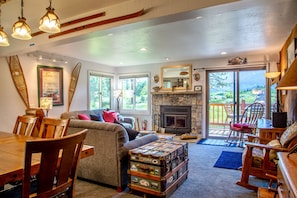 Living Room has comfortable furniture and mountain views from every seat!