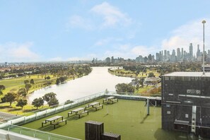 Alfresco dining on the rooftop takes in spectacular views across the Yarra and city skyline.
