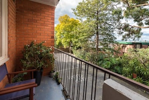 Enjoy your morning coffee on the balcony. Open the doors and allow the natural breezes to flow through the apartment. 