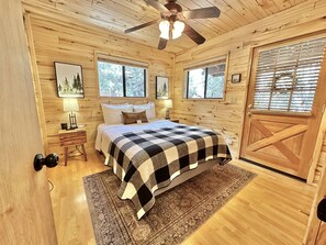 Master bedroom on main floor with private entrance to the back deck