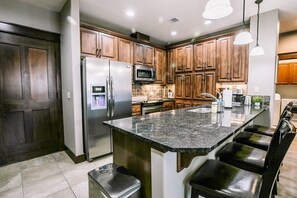 Kitchen and bar seating.