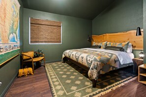 Master bedroom with King bed, featuring rustic and vintage decor.