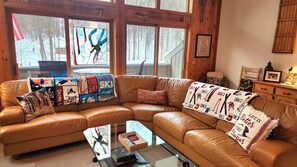 Cozy furnishings overlooking the Orange & Brown Ski Lifts