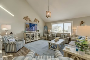Top-Level Living Room with Deck Access