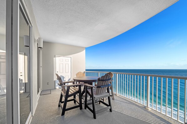 Balcony with table and 4 chairs