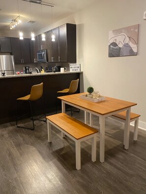 Picnic-style table with benches.