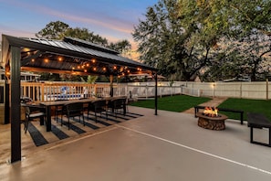 Outdoor seating area complete with fire pit for smores roasting & entertaining!