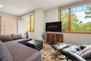 Living room area with 50" TV