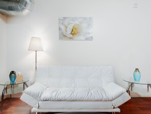 Furniture, Indoors, Living Room, Couch, Cushion