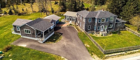 Sky view.  Guest cottage on the left, sunroom and main house on the right.