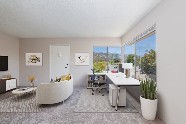 Open floor plan living room/dining room with Riviera views 