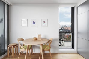 Enjoy a home cooked meal in the sun-lit dining area with additional seating provided should you need it