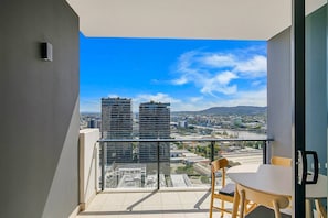Take in views across the city and river from the private balcony, an idyllic spot for your morning coffee.
