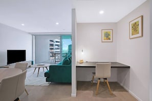 A dedicated workspace offers a comfortable and productive environment to tackle your tasks, with ample desk space and a cosy chair for focused work or remote meetings.