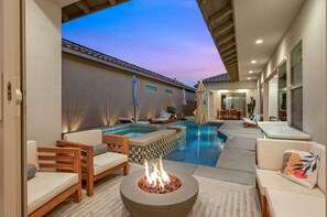 Outdoor oasis with pool and fire pit for cool nights