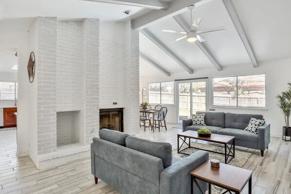 Living Area 1- Open living area with vaulted ceilings. Bright and spacious.