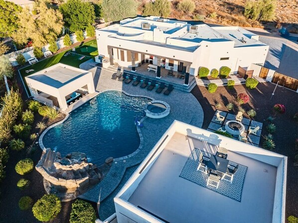 "Get a bird’s-eye view of your next getaway – our aerial shot captures the full charm of our entire home. 🏠✨"
