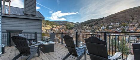 Outdoor Patio: "Serene view of mountains and charming neighborhood from your cozy retreat.