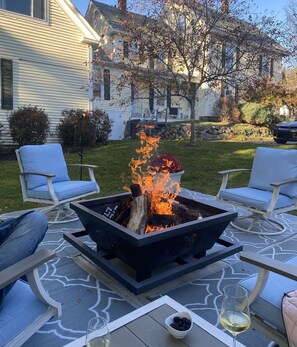Enjoy multiple lounge areas, Propane & wood fires!