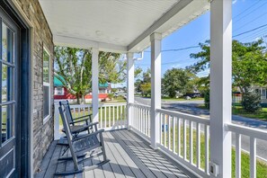 Sip Sweet Tea on the Covered Porch and watch our little Island come to life.