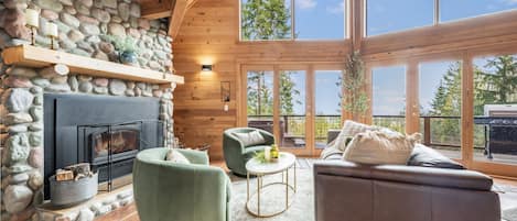 Living room with a view and wood-burning stove