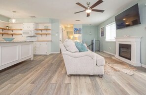 Spacious living, dining & kitchen area w a beautiful island w an open concept