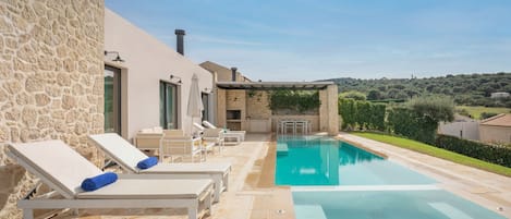 Relax and revive around the pool