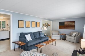 Upstairs living area - Plenty of seating to enjoy a stunning second story view of expansive Lake Charlevoix