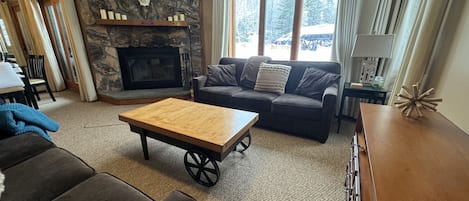 Living room with view of the Tamarack chair lift