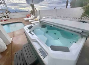 This home includes a above ground hot tub!