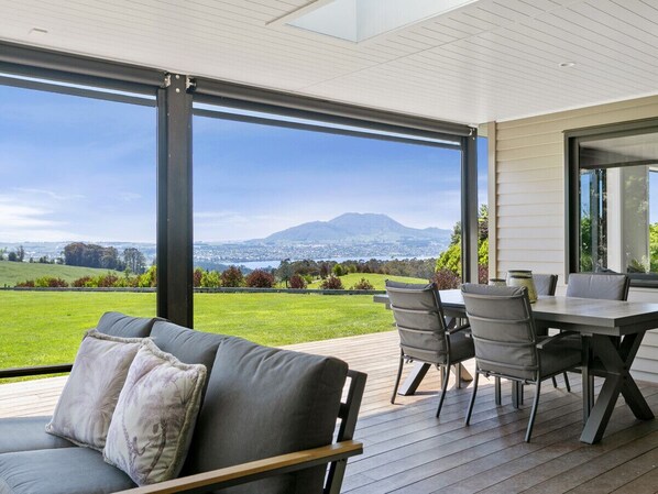 Alfresco dining and lounge, complete with an outdoor fireplace. An ideal haven for unwinding and enjoying the moment.