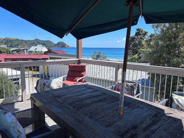 overlooking whangapoua beach and place to havel outdoor meals