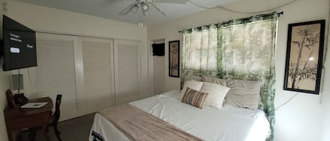bedroom with dedicated workspace