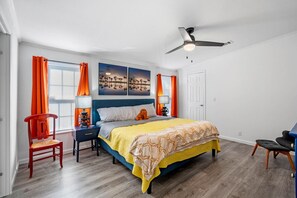 Master bedroom with King bed, bath, and Smart TV