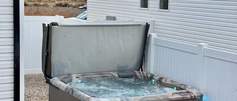 Private hot tub heated for use all year; seats 5