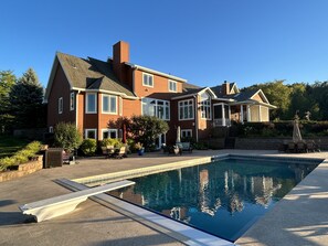 Evening sun on back of home inviting you to enjoy the pool.
