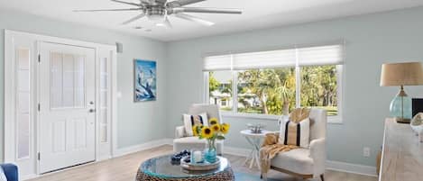 Light filled living room with ample seating