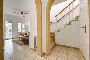 Living room and staircase to upstairs