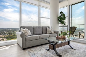 Sleep comfortably on the Queen Sofa bed in the living room and enjoy the city skyline and Rocky Mountain views!